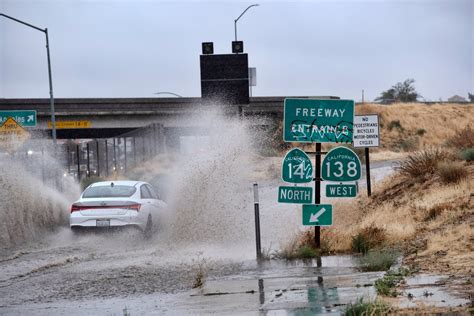 Rain from Tropical Storm Hilary lashes California, swamping roads and trapping cars